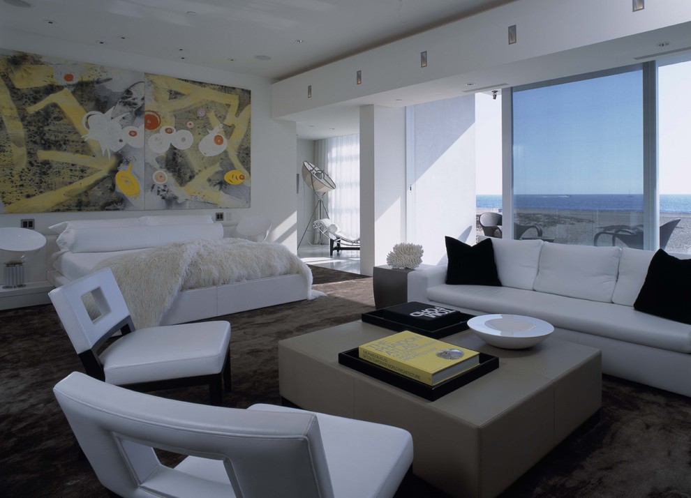 Inspiration for a contemporary bedroom in Orange County with white walls.
