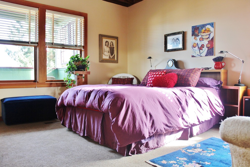 Photo of an eclectic bedroom in Seattle with beige walls, carpet and no fireplace.
