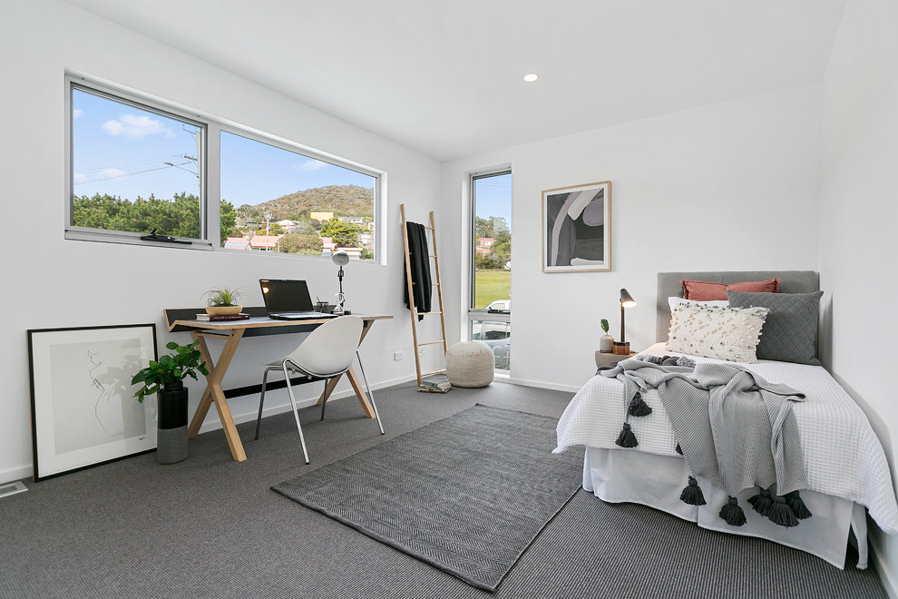 This is an example of a contemporary bedroom in Hobart.