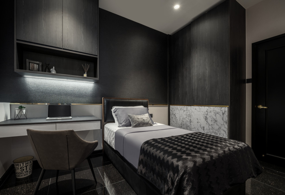 Foto di una camera da letto design con pareti grigie e pavimento nero