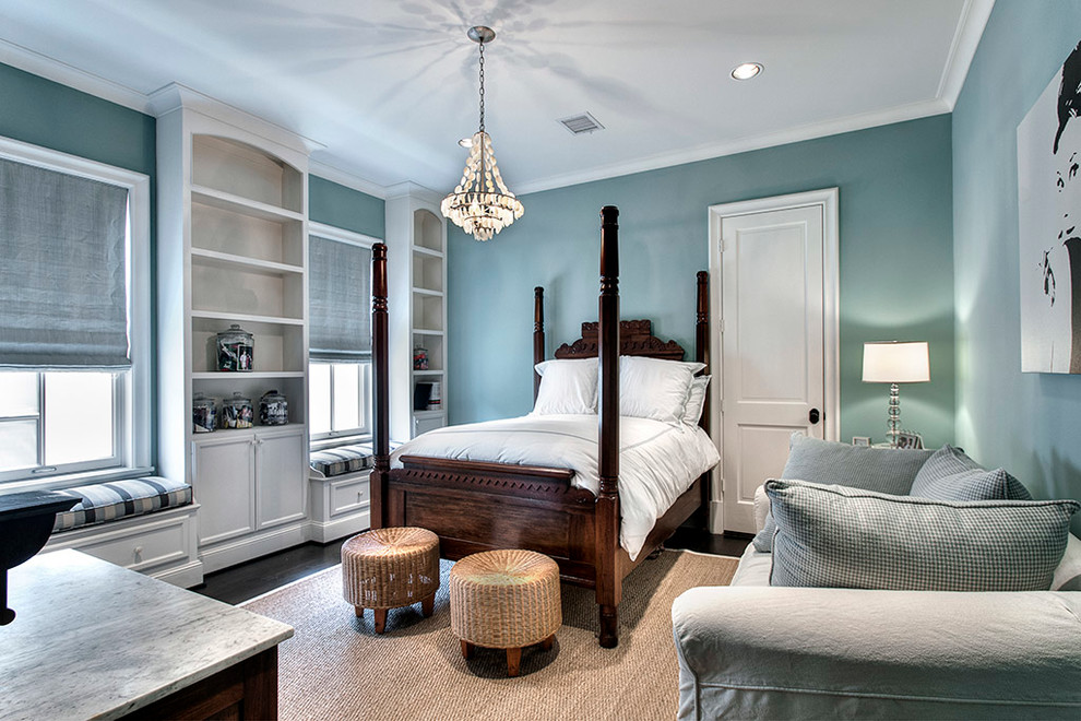 Elegant bedroom photo in Houston with blue walls