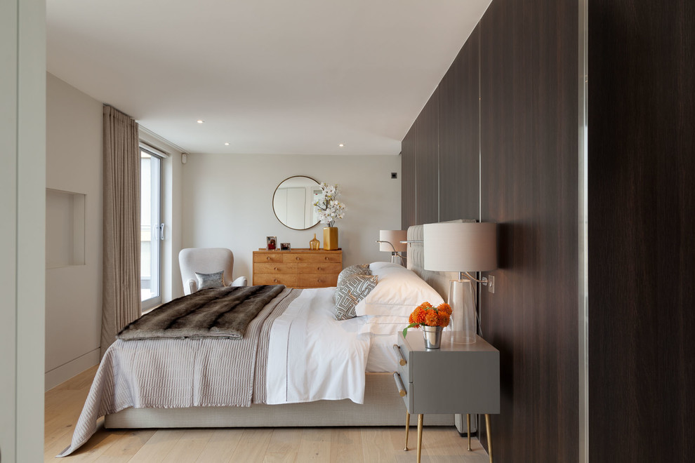 Photo of a large contemporary bedroom in London.