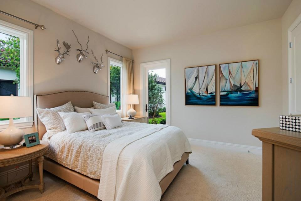 Inspiration for a mid-sized coastal guest carpeted bedroom remodel in Miami
