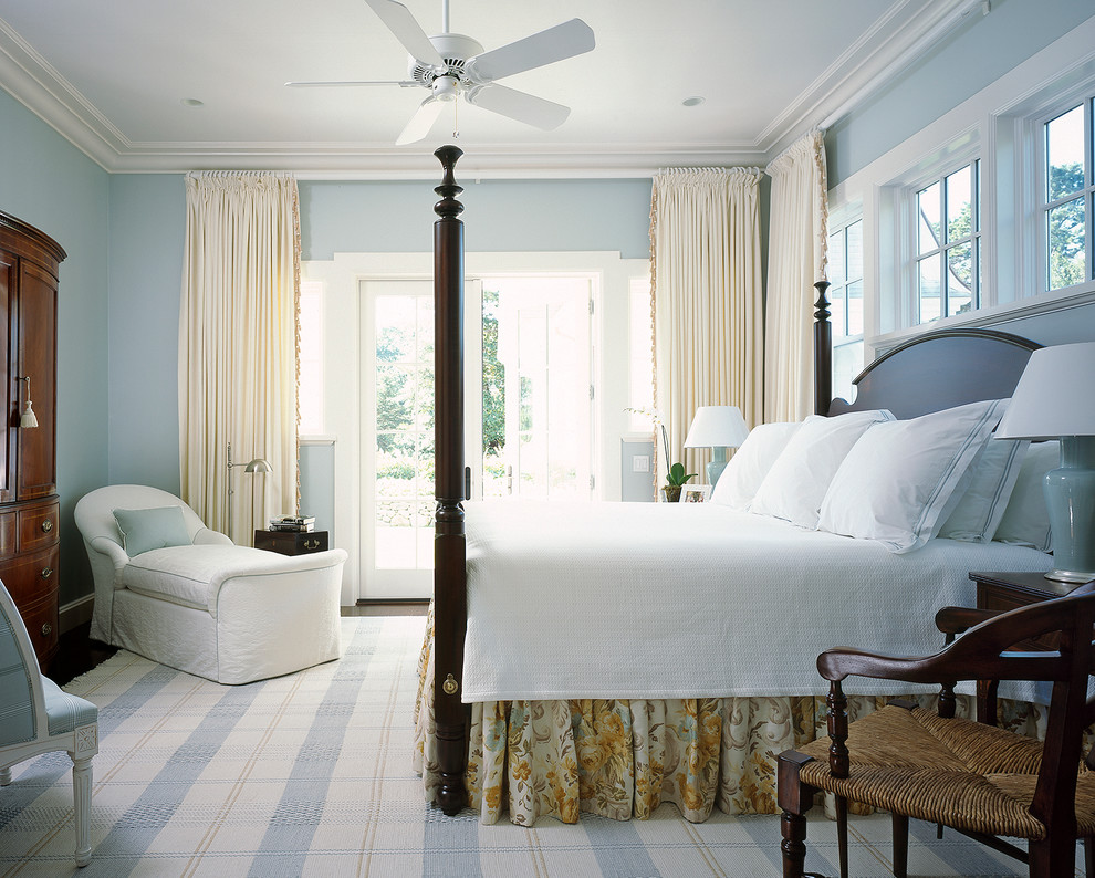 Beach style bedroom photo in Boston with blue walls