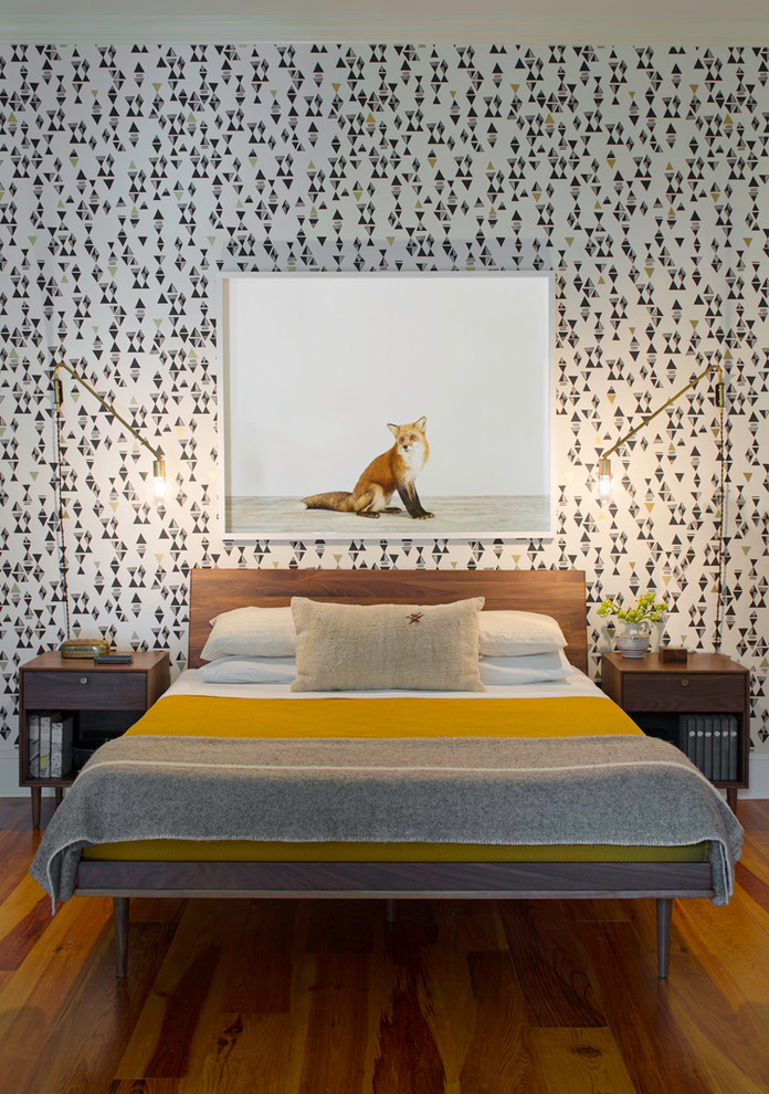 Inspiration for a mid-sized contemporary master medium tone wood floor bedroom remodel in Atlanta with multicolored walls
