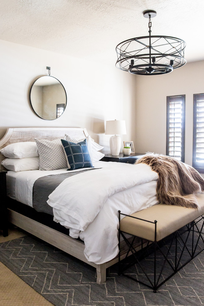 Example of a transitional master carpeted and beige floor bedroom design in Salt Lake City with beige walls