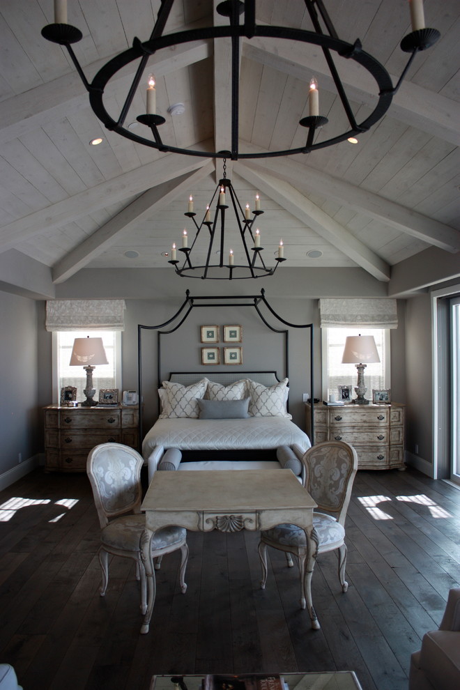 Traditional bedroom in Orange County with grey walls.