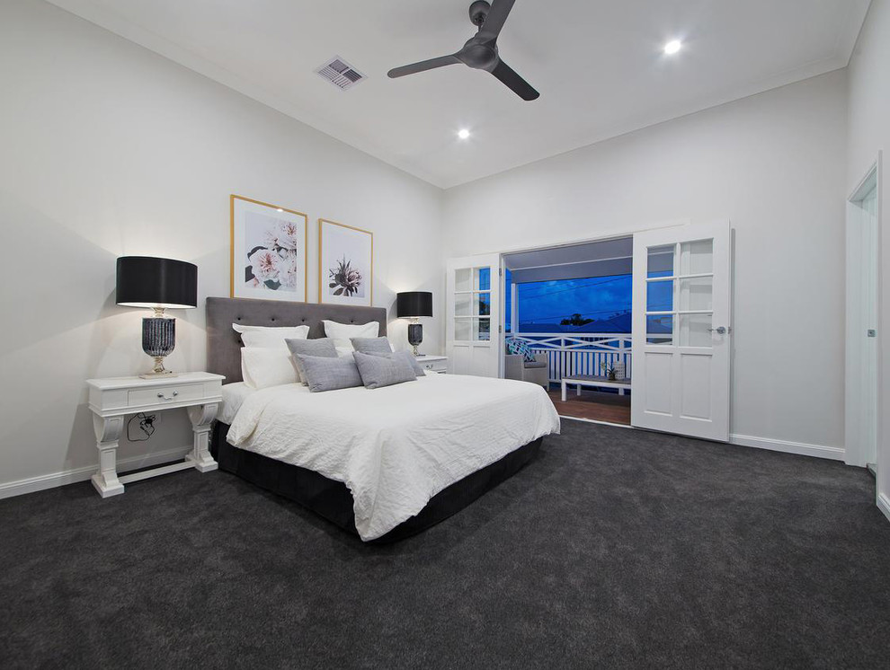 Example of a large classic master carpeted and gray floor bedroom design in Brisbane with gray walls