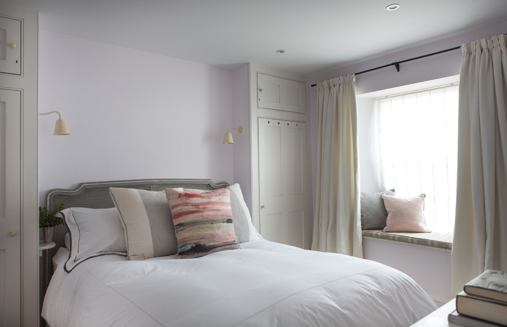 Example of a beach style bedroom design in London