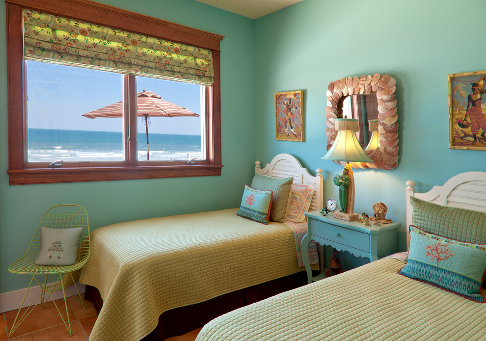 Example of a beach style guest ceramic tile bedroom design in Orlando with blue walls