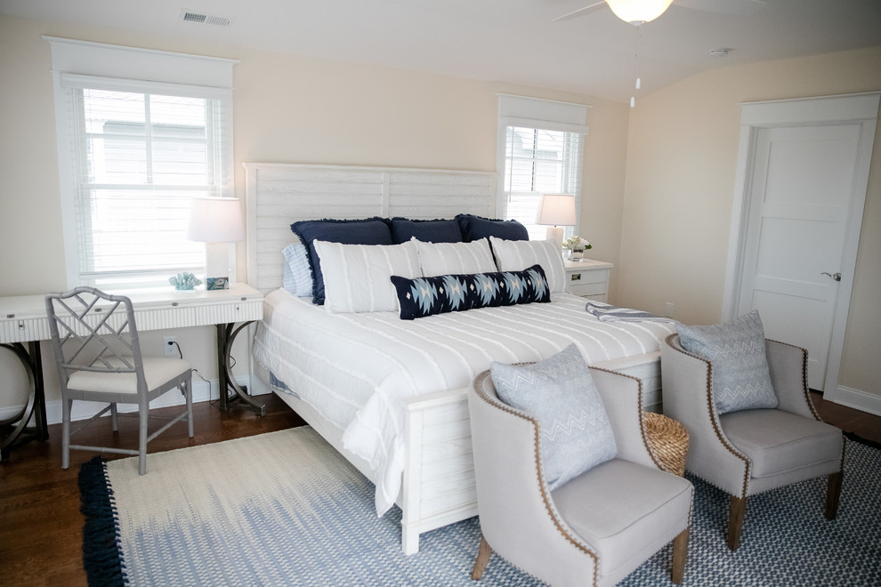 Bedroom - coastal master medium tone wood floor and brown floor bedroom idea in Philadelphia with beige walls