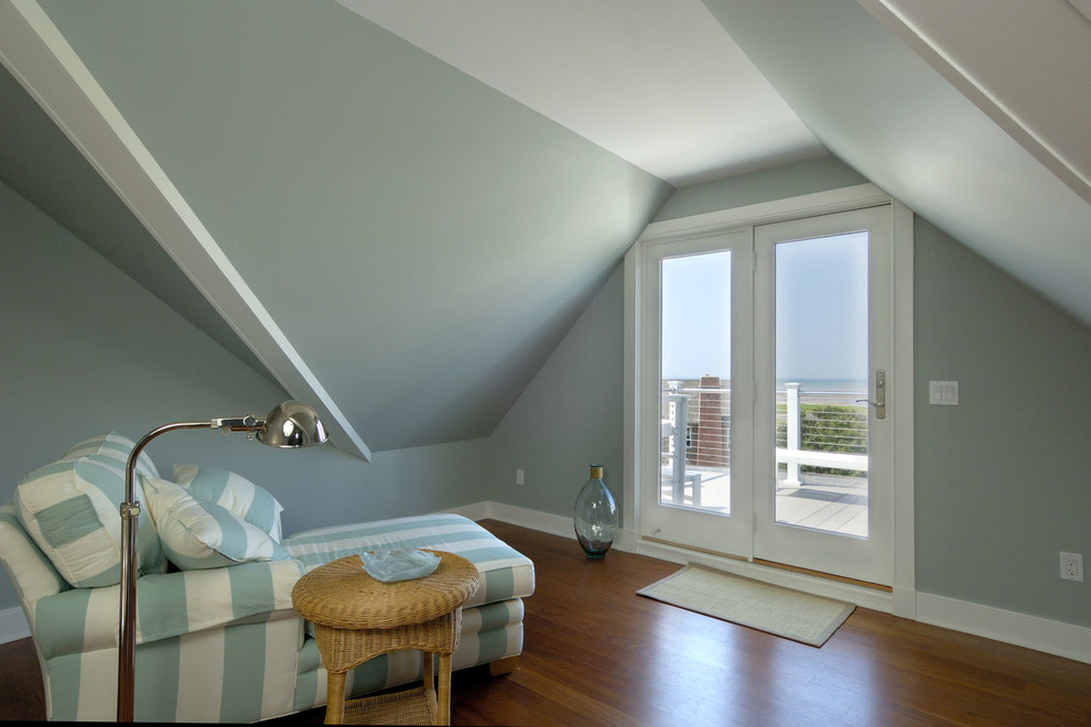 Inspiration for a large nautical bedroom in Boston with blue walls and medium hardwood flooring.