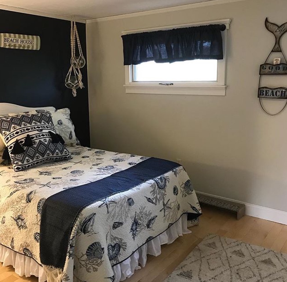 Bedroom - mid-sized coastal guest light wood floor bedroom idea in Portland Maine with blue walls