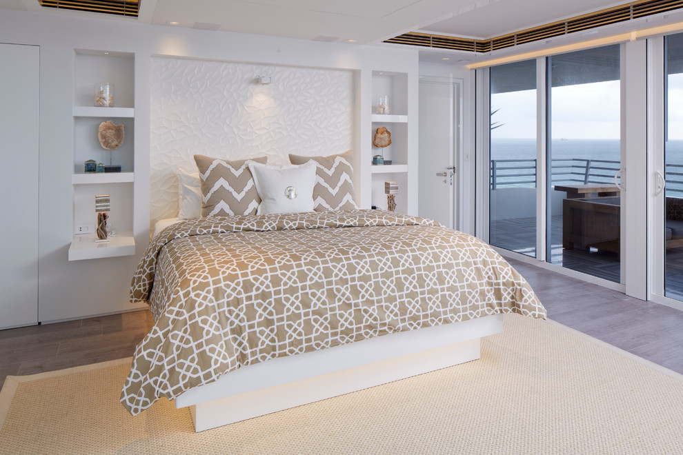 Inspiration for a beach style grey and cream bedroom in Miami.