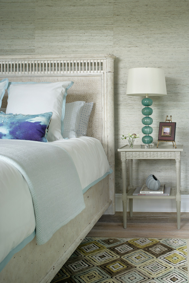 Medium sized coastal guest bedroom in Other with blue walls.