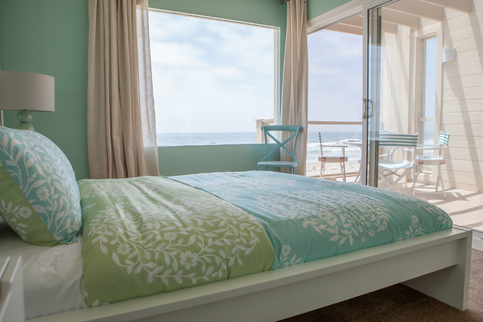 Example of a beach style bedroom design in San Diego