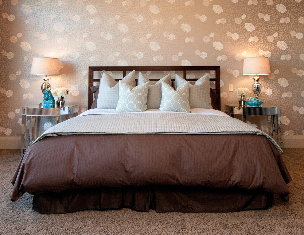 Inspiration for a transitional carpeted bedroom remodel in Calgary with beige walls