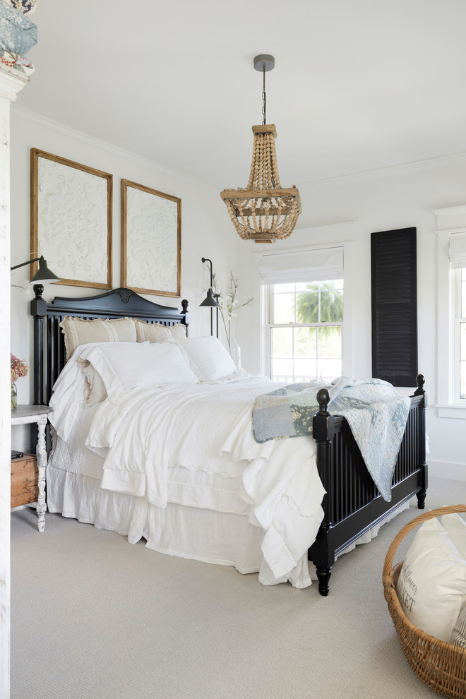 Inspiration for a mid-sized farmhouse master carpeted and gray floor bedroom remodel in Minneapolis with white walls