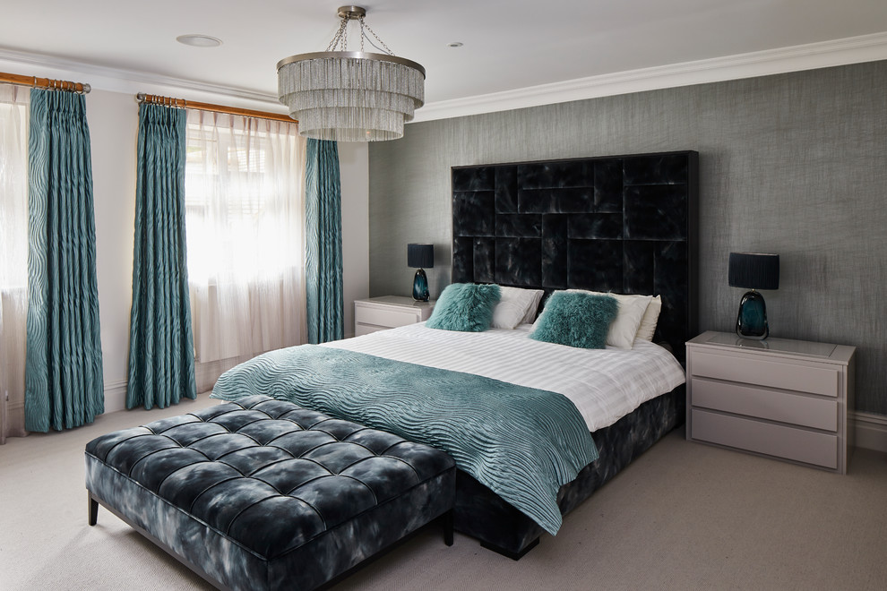 Contemporary bedroom in Kent with white walls, carpet and beige floors.