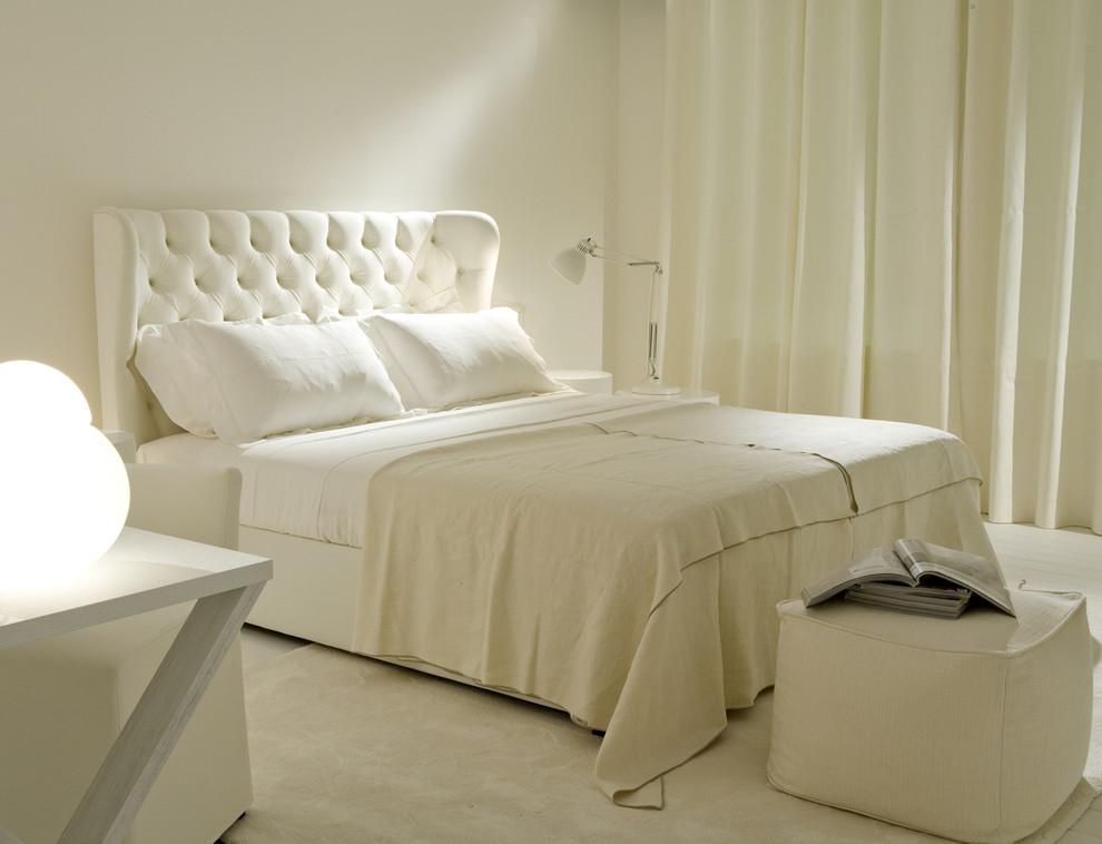 Example of a transitional carpeted bedroom design in Philadelphia with white walls