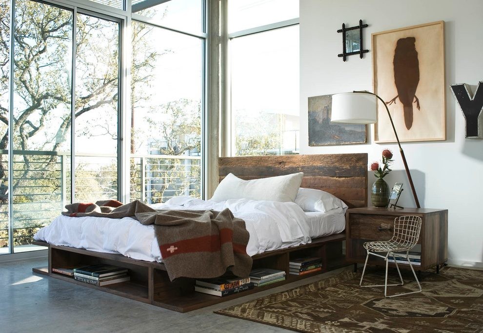 Bedroom - rustic concrete floor and gray floor bedroom idea in Houston with white walls