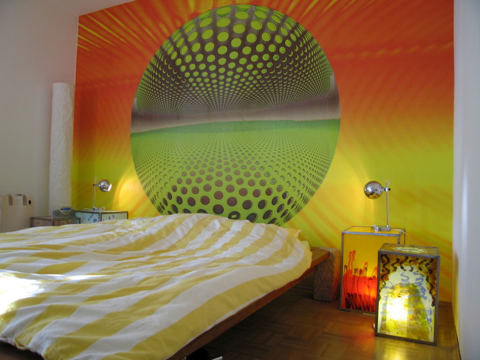 Mid-sized urban master medium tone wood floor bedroom photo in Sydney with multicolored walls