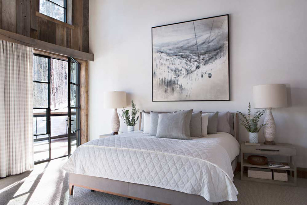 Photo of a rustic master bedroom in Birmingham with white walls and carpet.