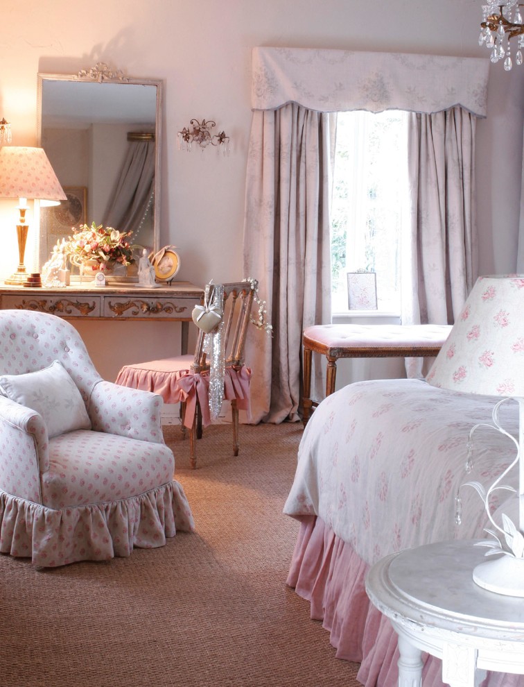 This is an example of a rural grey and pink bedroom in Hampshire.