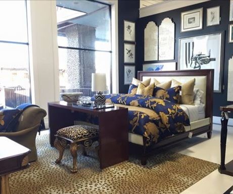 Design ideas for a large traditional master bedroom in Dallas with black walls and concrete flooring.