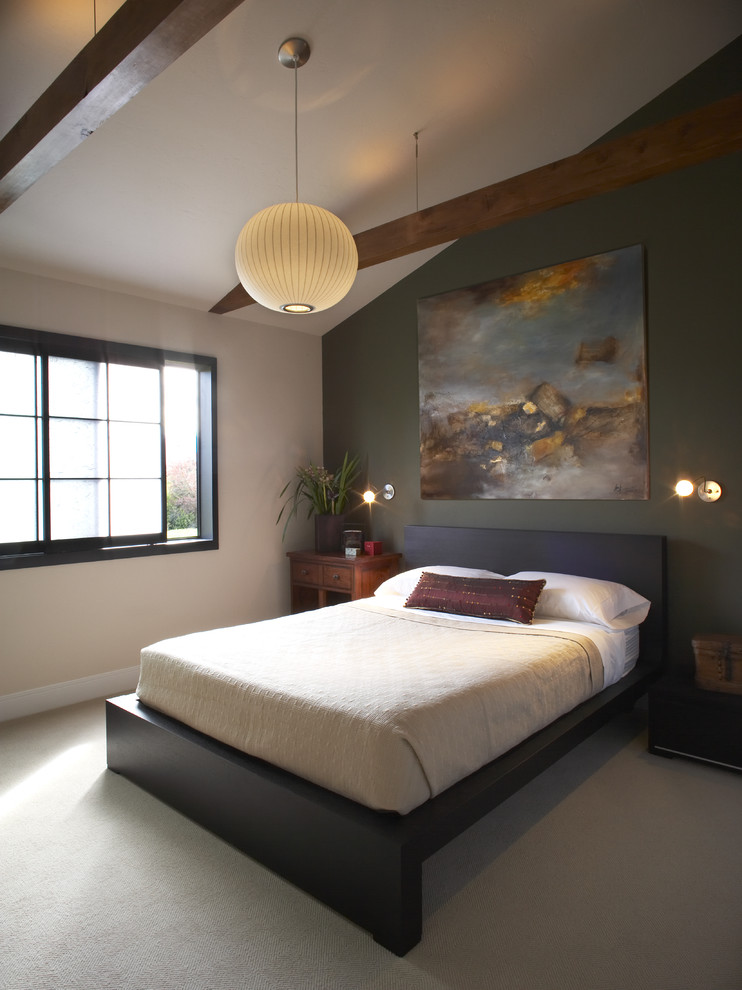 Example of a zen carpeted bedroom design in San Francisco with green walls