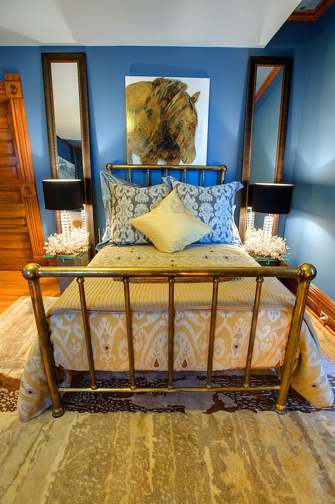 Bedroom - eclectic bedroom idea in Calgary with blue walls