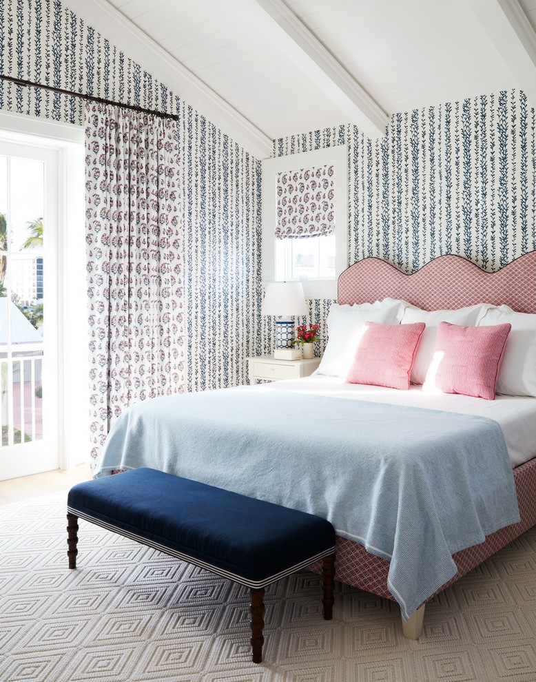 Classic guest bedroom in Other with blue walls, light hardwood flooring and beige floors.