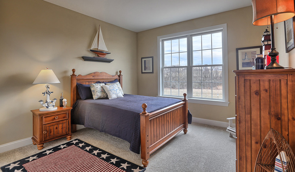 Photo of a medium sized coastal bedroom in Other with carpet, no fireplace and beige walls.