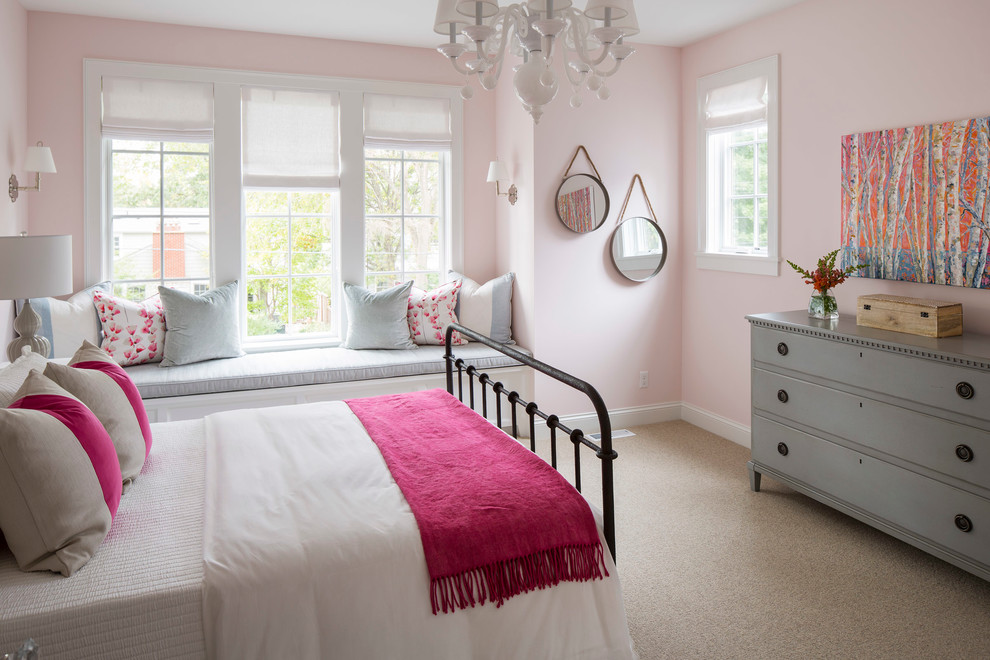 This is an example of a medium sized contemporary guest bedroom in Minneapolis with pink walls, carpet, no fireplace and beige floors.
