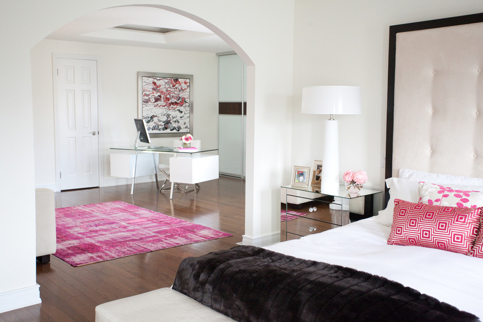 Inspiration for a contemporary master bedroom in Toronto with white walls, medium hardwood flooring and no fireplace.