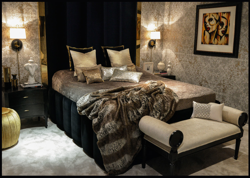Example of a mid-sized trendy master carpeted bedroom design in Belfast with beige walls