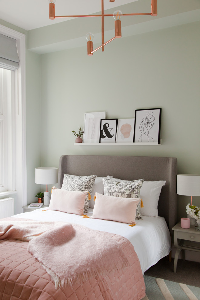 Traditional grey and pink bedroom in Other with carpet and grey floors.