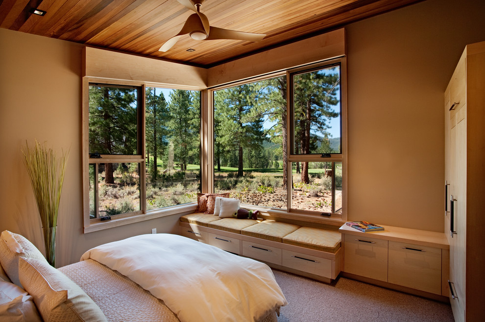 Bedroom - rustic carpeted bedroom idea in Sacramento with beige walls