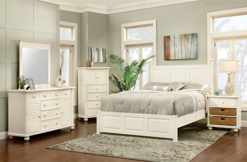 Design ideas for a medium sized beach style guest bedroom in Manchester with medium hardwood flooring and brown floors.