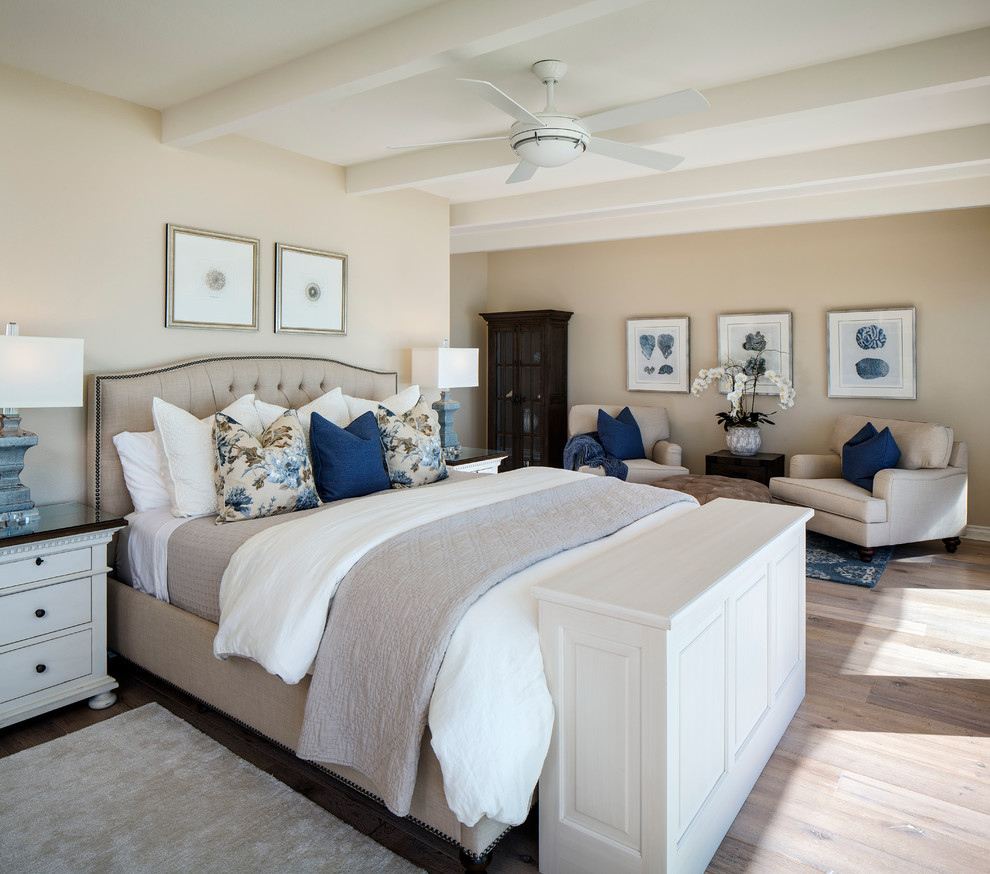 Bedroom - large traditional master dark wood floor and brown floor bedroom idea in Orange County with beige walls