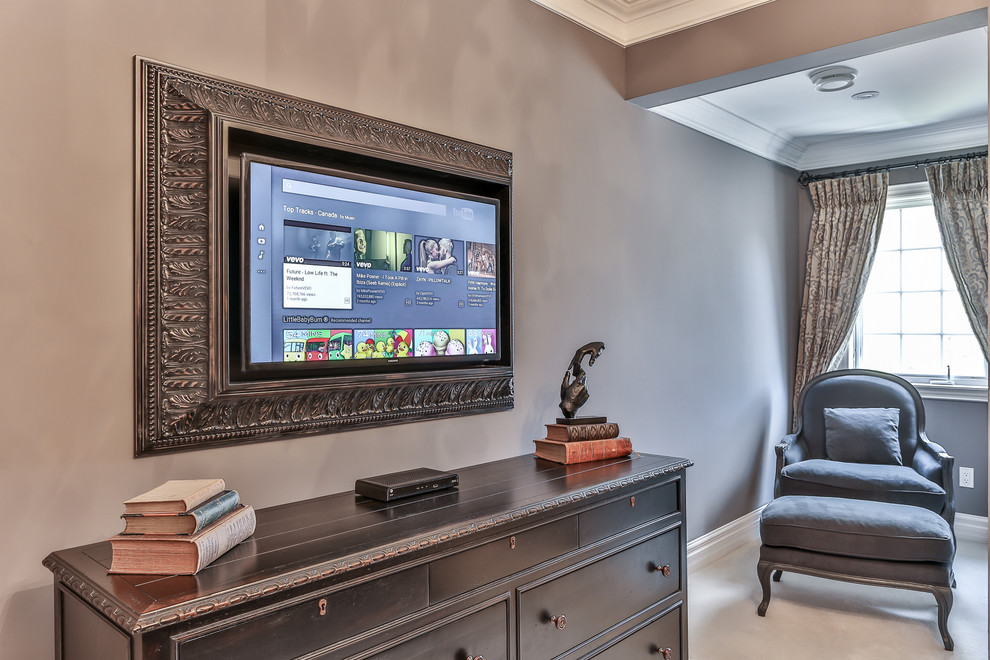 Bedroom with sitting area and custom TV wall mount Traditional