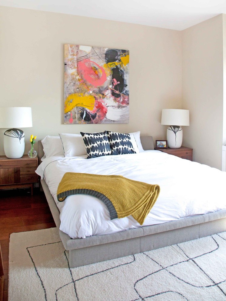 Example of a trendy dark wood floor bedroom design in Seattle with beige walls