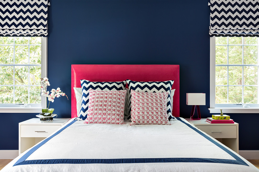 Trendy bedroom photo in New York with blue walls
