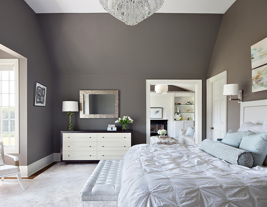 Design ideas for a traditional grey and silver bedroom in New York with feature lighting.