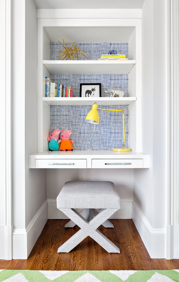 Transitional medium tone wood floor bedroom photo in New York with multicolored walls