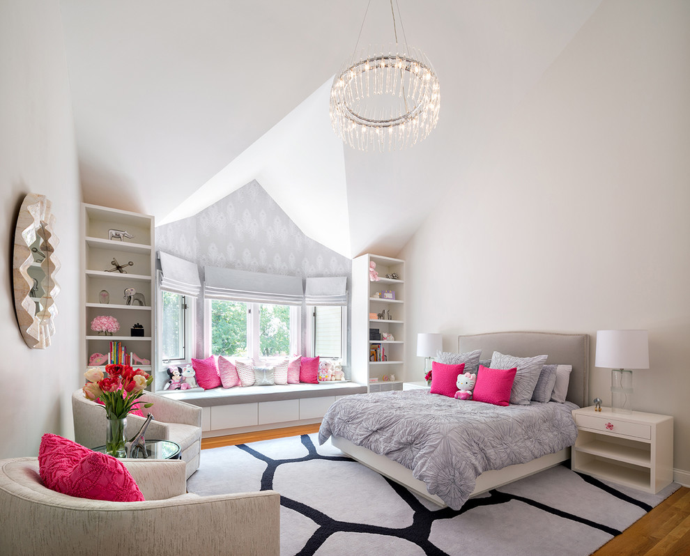 Inspiration for a large classic grey and pink bedroom in New York with white walls, light hardwood flooring and feature lighting.