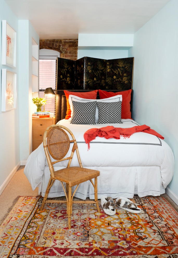 Eclectic bedroom photo in New York with white walls