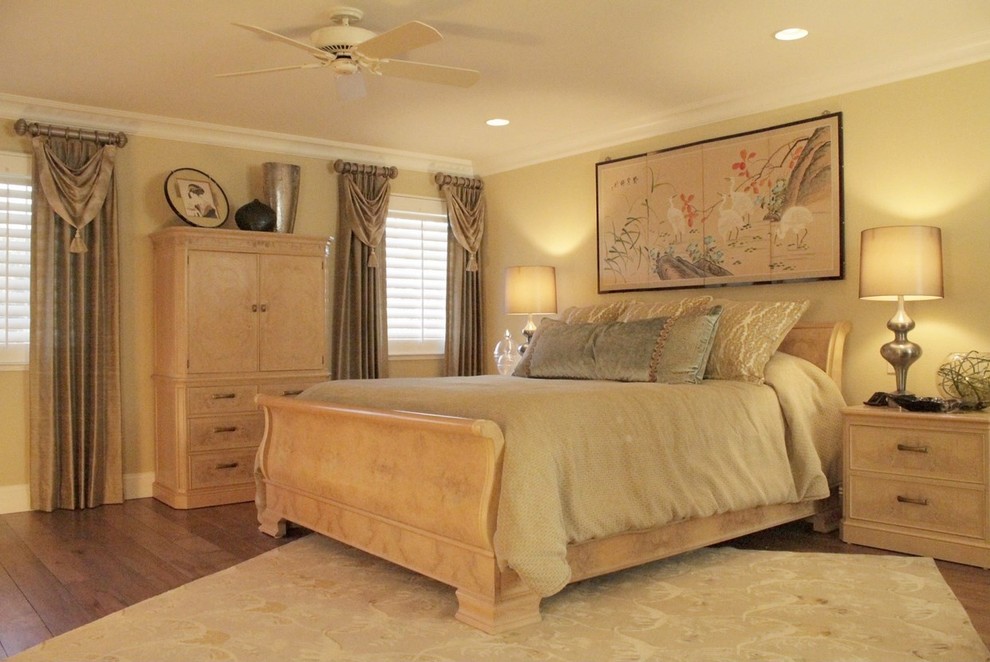 Inspiration for a large master medium tone wood floor bedroom remodel in San Francisco
