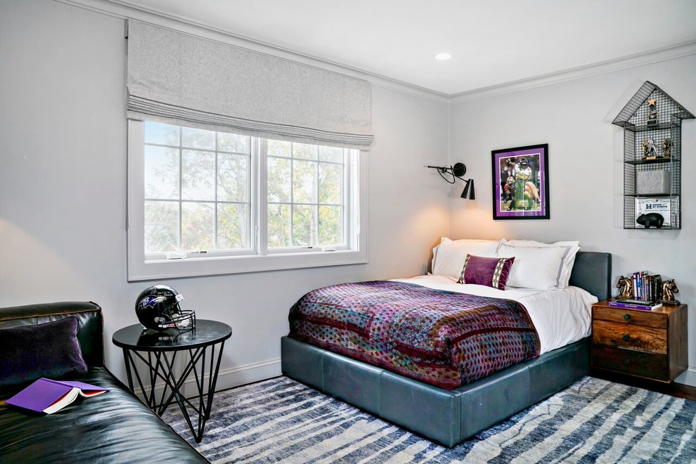 Ejemplo de dormitorio minimalista de tamaño medio con paredes grises y moqueta