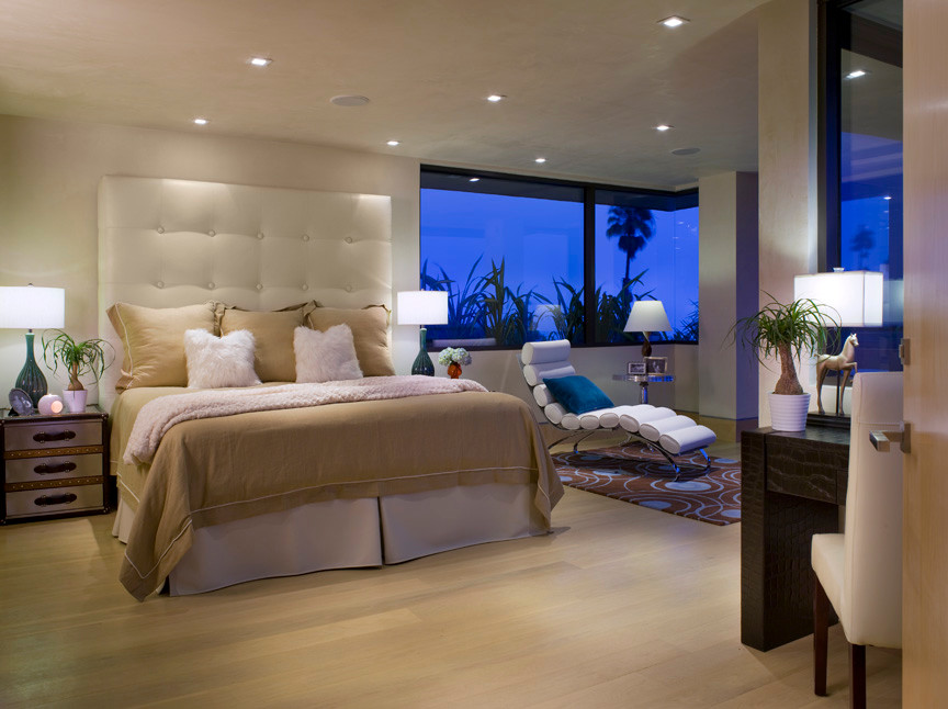 Example of a transitional bedroom design in San Diego